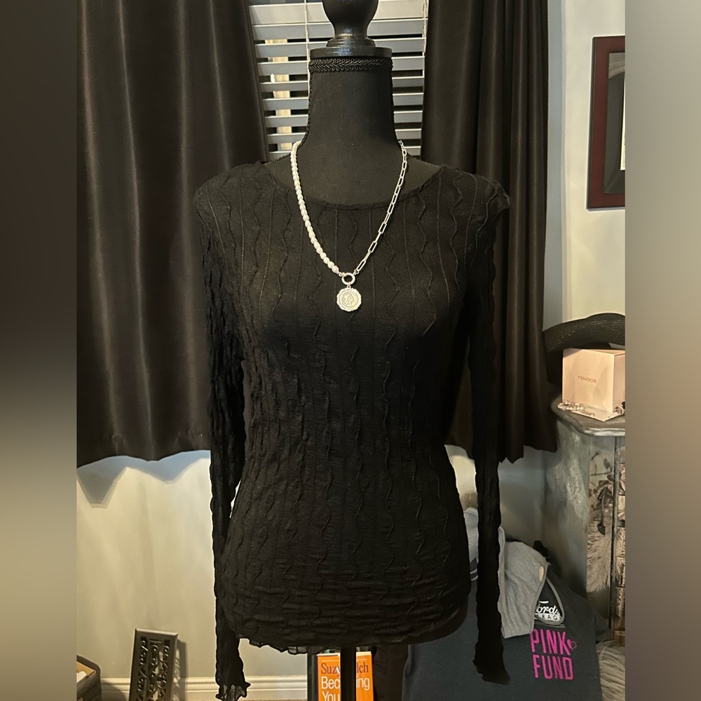 Black long sleeve sweater with a unique pattern #longsleeve #sweater
